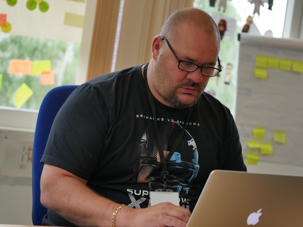 Phil Mawson at desk