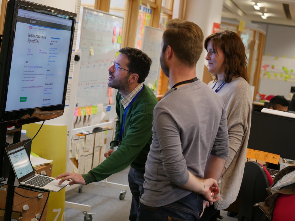 User Researchers, Claudio and Simon, working with the Content Designer, Joanne