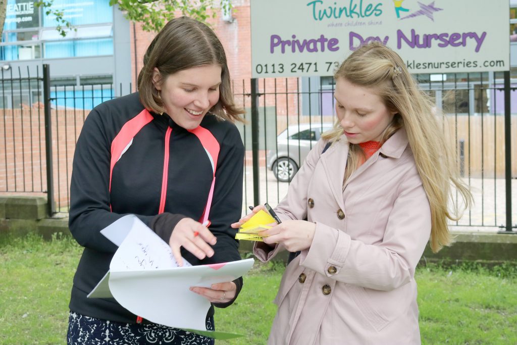 Emma and a colleague compare notes during user research at GovJam 2016