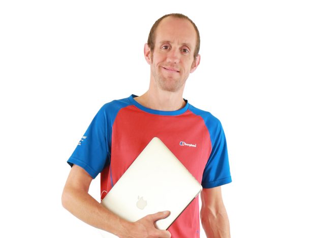 Steve Brooks holding a computer