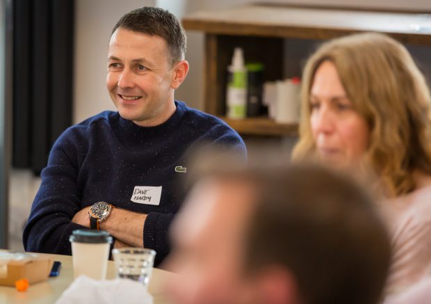 DWP Digital product owner Dave Hardy and two colleagues listen to talks at Product People North