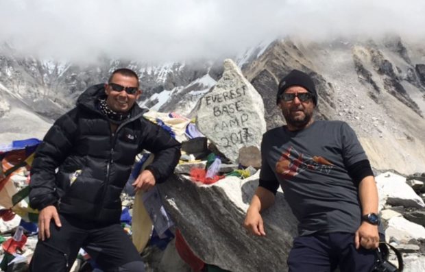 Chris and Darren stood at Everest Base Camp