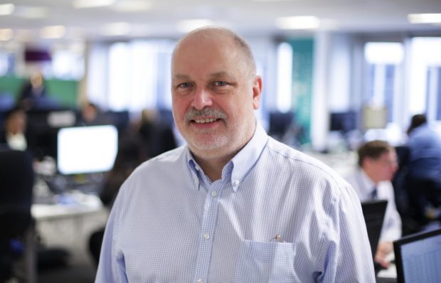 Head and shoulders shot of Simon McKinnon, Chief Digital and Information Officer (interim), DWP Digital