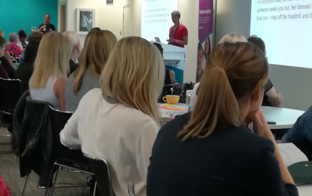 The women in digital event audience sat listening to Cheryl Stevens present