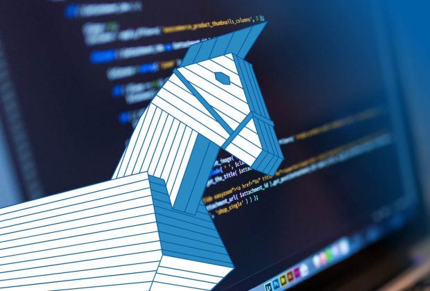 A graphic of a wooden Trojan horse in front of a computer screen displaying computer code