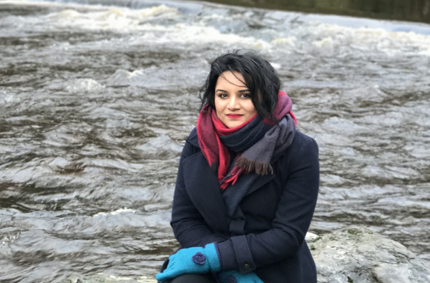 Photo of Swetha sat by a river