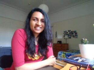 Head and shoulders shot of Shivangi Das working from home