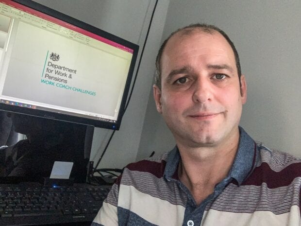 Head shot of Steven Buckley next to his computer screen