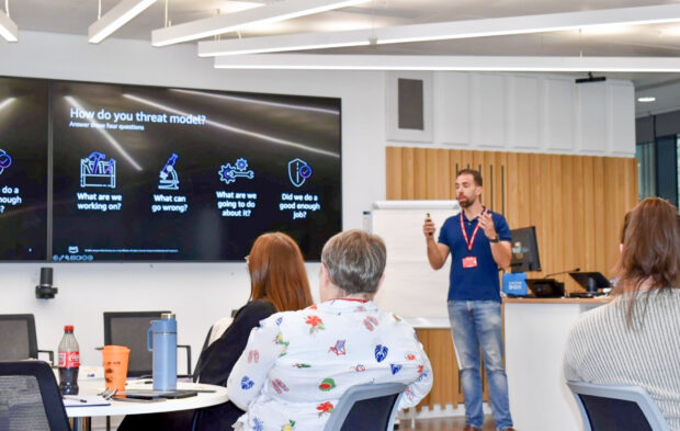 Danny presenting to attendees