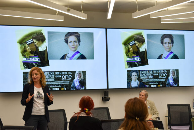 Helen stood presenting to attendees